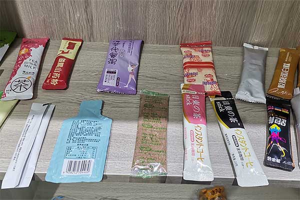 奶茶粉末包裝機可采用三邊封、四邊封、圓角袋型